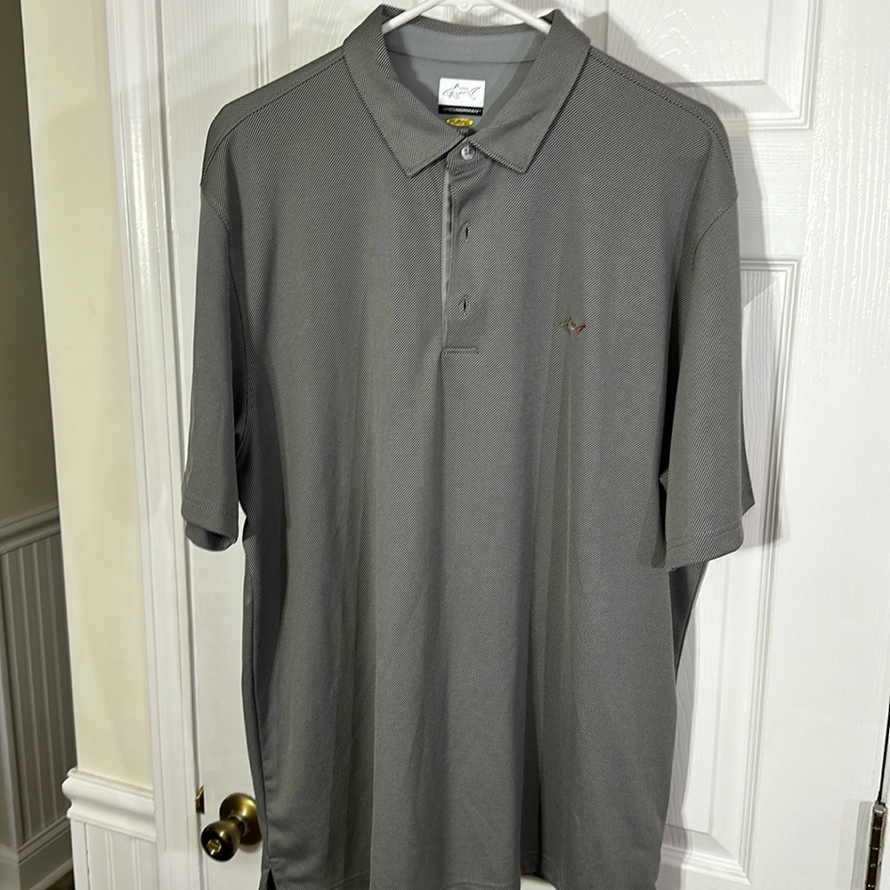Greg Norman Men’s XXL golf shirt.